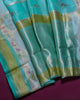 Soft Aqua Organza Saree with Gold and Silver Stripes
