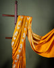 Yellow Banarasi Mashru Silk Saree with Pichwai-Inspired Border